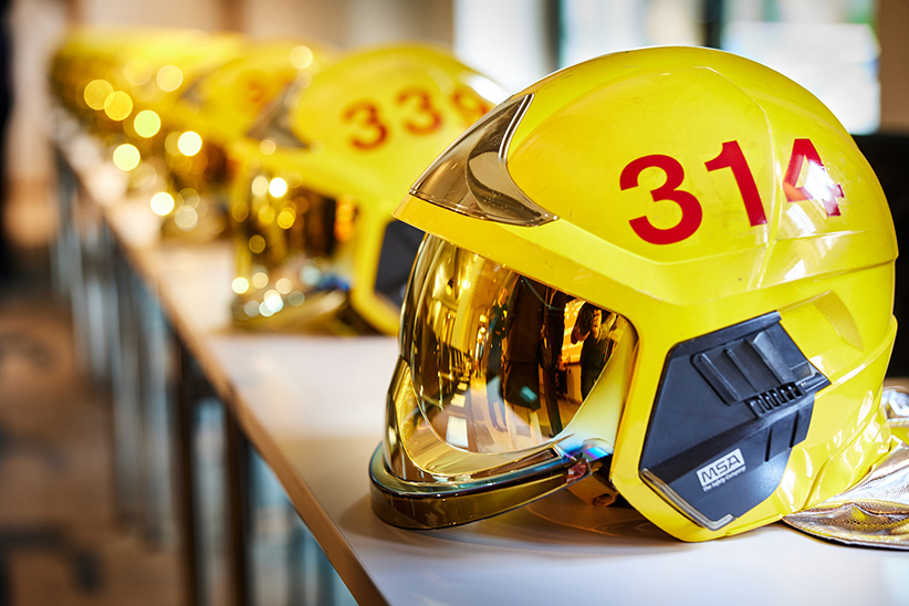 Row of helmets for rescuers.