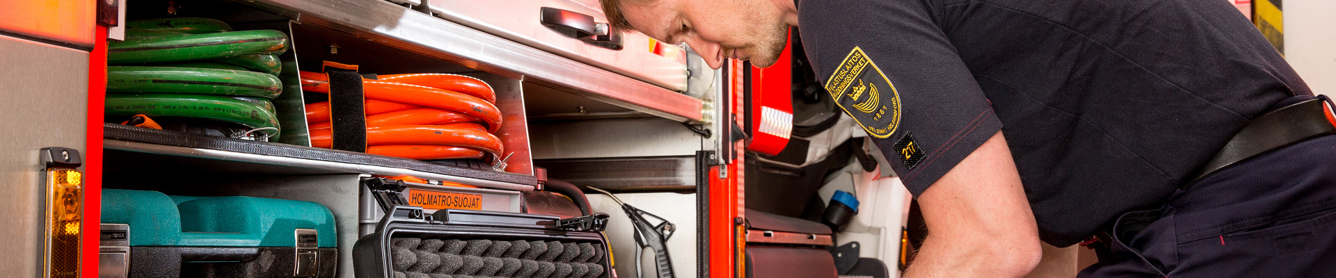 A firefighter checks equipments